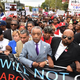 The Rev. Al Sharpton marches with protesters at a rally against police brutality in memory of Eric Garner Aug. 23, 2014, in the New York City borough of Staten Island.
Stan Honda/AFP/Getty Images
